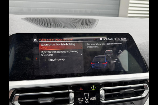 BMW 3 Serie Touring 320i High Executive M-Sport | Panoramadak | Camera | Head-Up Display | DAB |