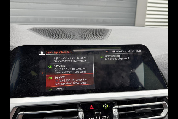 BMW 3 Serie Touring 320i High Executive M-Sport | Panoramadak | Camera | Head-Up Display | DAB |