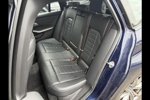 BMW 3 Serie Touring 320i High Executive M-Sport | Panoramadak | Camera | Head-Up Display | DAB |