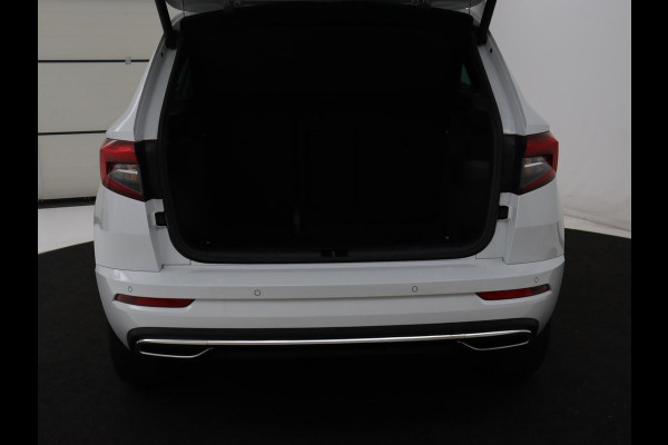 Škoda Karoq 1.5 TSI Sportline | Panoramadak | Stoelverwarming | Adaptive cruise | Camera | Sportstoelen | Virtual Cockpit | Navigatie | Sfeerverlichting | Full LED | 18'' | Keyless | Climate control