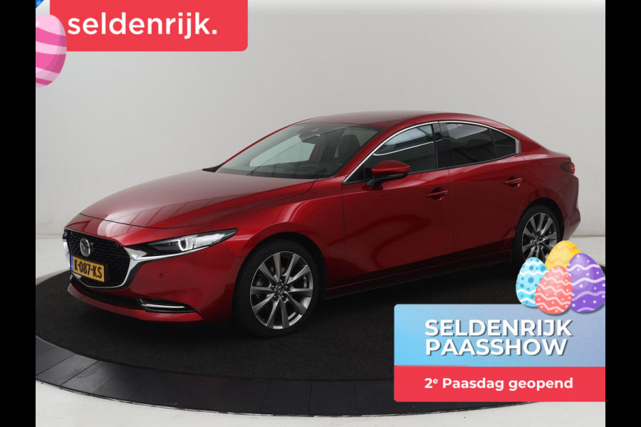 Mazda 3 2.0 e-SkyActiv-X M Hybrid 180 Luxury | Leder | Head-Up | Stoelverwarming | Trekhaak | Bose Sound | Camera | Carplay | Memory | Adaptive cruise | Navigatie | Full LED | Stuurverwarming | Keyless