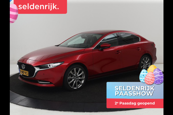 Mazda 3 2.0 e-SkyActiv-X M Hybrid 180 Luxury | Leder | Head-Up | Stoelverwarming | Trekhaak | Bose Sound | Camera | Carplay | Memory | Adaptive cruise | Navigatie | Full LED | Stuurverwarming | Keyless