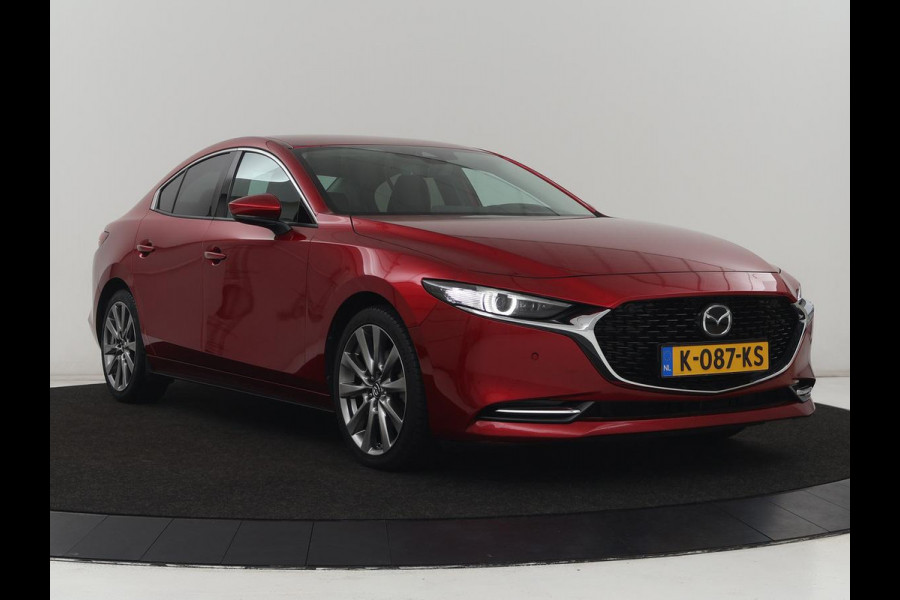 Mazda 3 2.0 e-SkyActiv-X M Hybrid 180 Luxury | Leder | Head-Up | Stoelverwarming | Trekhaak | Bose Sound | Camera | Carplay | Memory | Adaptive cruise | Navigatie | Full LED | Stuurverwarming | Keyless
