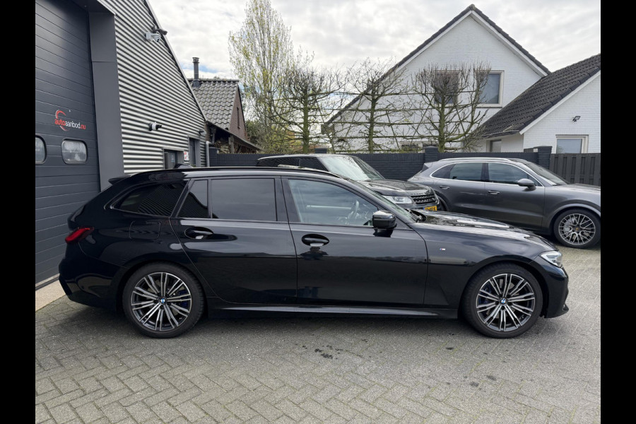 BMW 3 Serie Touring 320i High Executive M-Sport | Panoramadak | Camera | Head-Up Display | DAB | Stoelverwarming | Elektrische Achterklep |