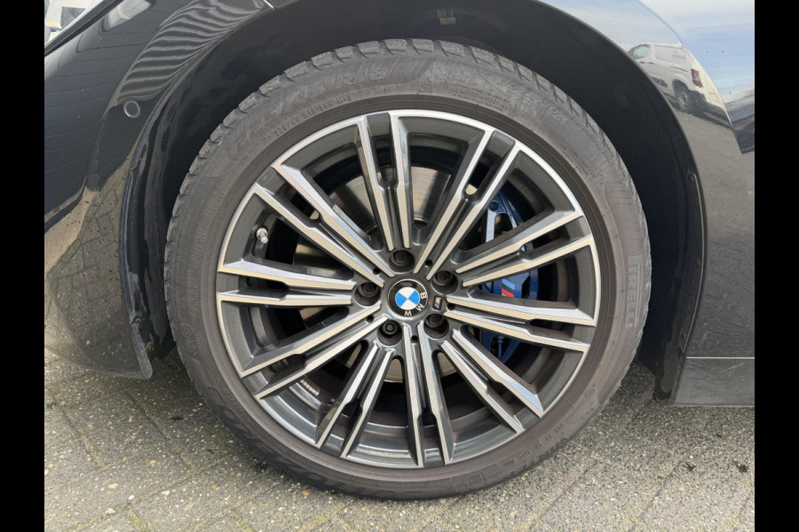 BMW 3 Serie Touring 320i High Executive M-Sport | Panoramadak | Camera | Head-Up Display | DAB | Stoelverwarming | Elektrische Achterklep |