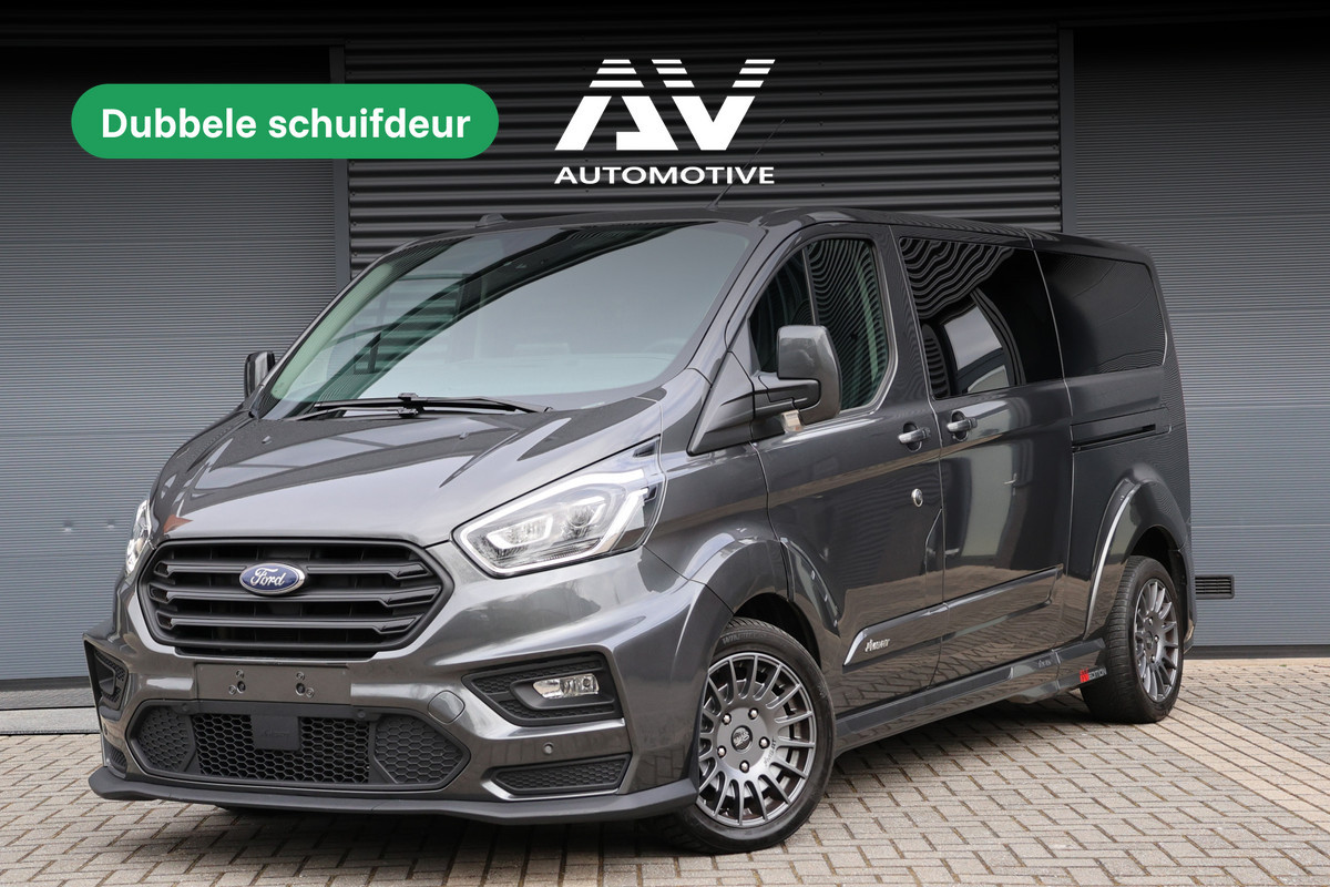 Ford Transit Custom 320 2.0 TDCI L2H1 MS-RT | ACC | BLIS | L+R Schuifdeur | SORTIMO | CarPlay | Navigatie | Camera | Stoelverwarming | 3-Zitter | PPF Folie | Lederen bekleding | Spoiler-pakket | Nieuwe APK