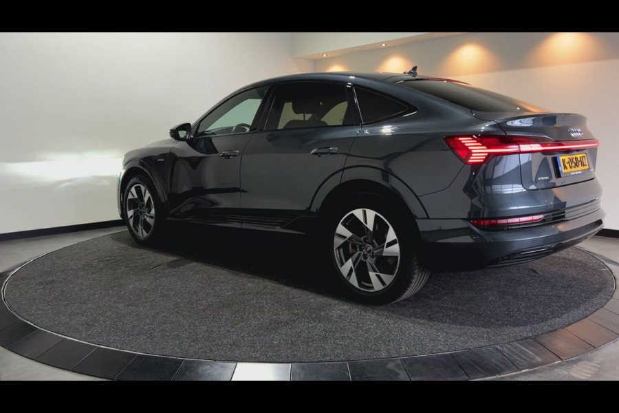 Audi e-tron Sportback 55 quattro Business edition Plus 95 kWh | Panoramadak } voorstoelen verwarmd Soh (batterijcheck) Waarde 91,0 %