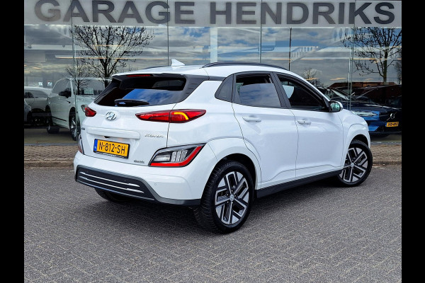 Hyundai Kona EV Fashion 64 kWh | SOH: nnb | 3 Fase | Warmtepomp | Blindspot | Navi | Camera |