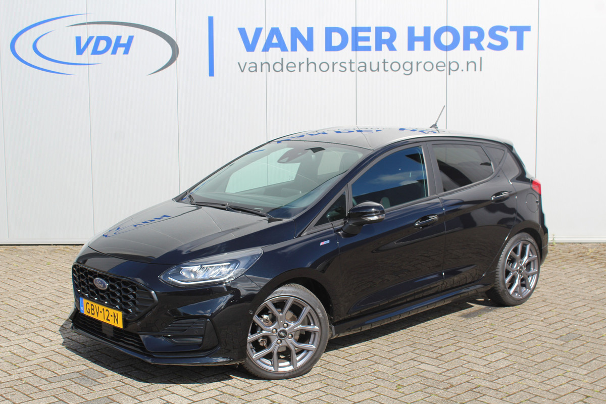 Ford Fiesta 1.0-100pk EcoBoost ST-Line. Luxe en sportieve Fiesta ! Stoel-, stuur- en voorraamverwarming, keyless entry/keyless go, adaptive cruise cntrl, volautm. airco, camera, parkeersensoren v+a, navigatie by Apple/Android, LM wln, lane assist, LED verlic