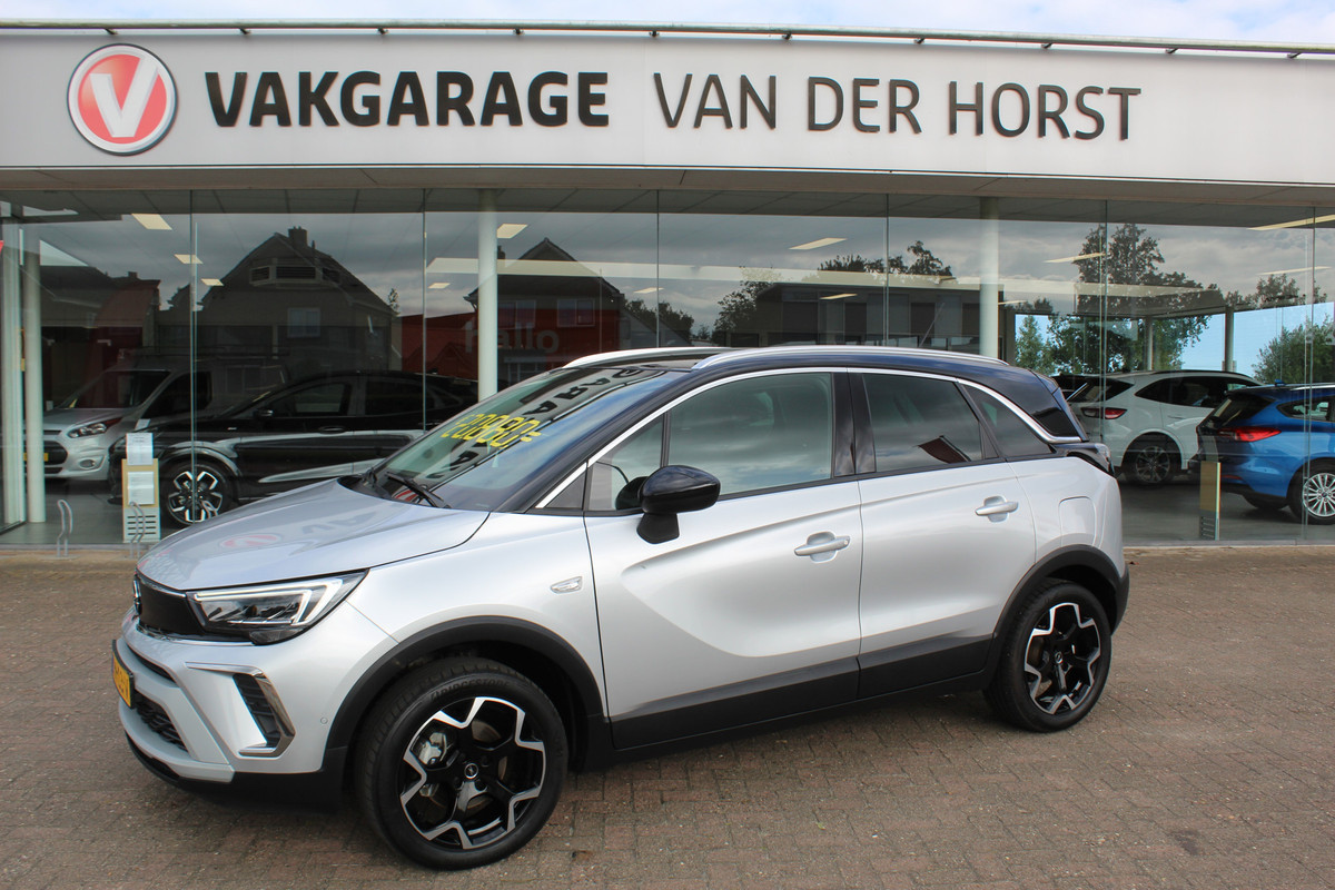 Opel Crossland 1.2-110pk Turbo 'Elegance'. Mooie en luxe hoogzitter met weinig km's ! Volautm. airco dual, cruise control, camera, comfortstoelen, metallic lak,  LM wielen, navigatie, telefoonvoorb., lane- en side assist, parkeersensoren v+a,  LED verlichting  etc.