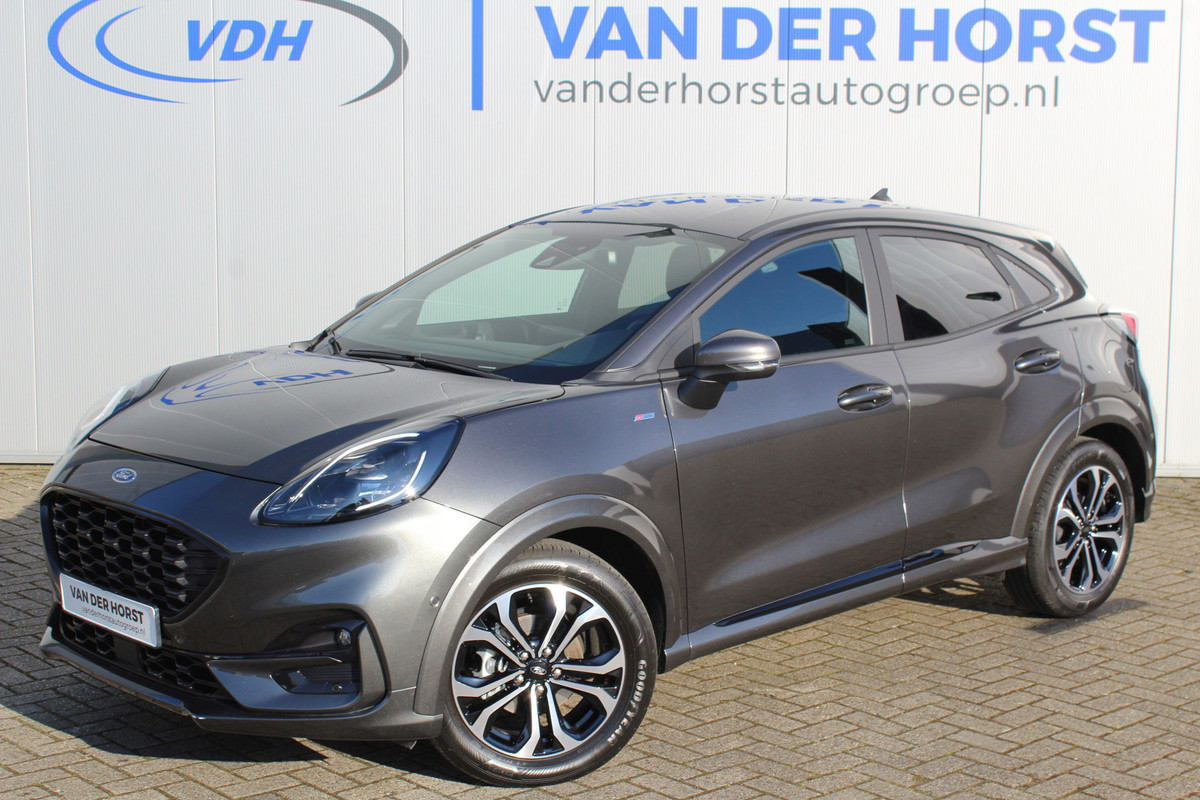 Ford Puma 1.0-125pk EcoBoost Hybrid ST-Line. April 2024 ! Slechts 11.800km ! Autm. airco, navigatie, telefoonvoorb., camera, pdc v+a, parkeerassistent, LED verl., metallic lak, LM wielen, stoel-, stuur- en voorraamverw., lane- en sideassist, adapt. cruise cntrl etc