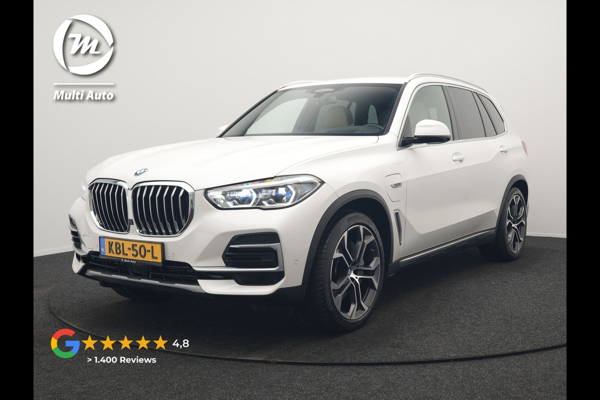BMW X5 xDrive45e X Line PHEV 395pk Dealer O.H. | Trekhaak Af Fabriek | Luchtvering | Adaptive Cruise | Head Up | 360 Camera | Adaptief Onderstel | Laser LED | Lederen Sportstoelen Memory & Verwarmd | Sfeerverlichting | Keyless | Plug In H