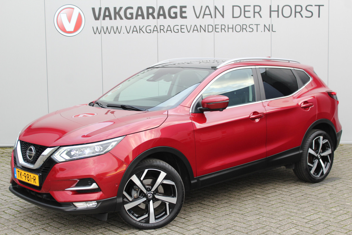 Nissan QASHQAI 1.2-115pk Tekna. Erg nette, luxe en betrouwbare hoogzitter ! Autm. airco, cruise control, 360gr camera, trekhaak, privacy glass, LM wielen, panoramadak, metallic lak, elektr. verstelb. best. stoel,  telefoonvoorb., navigatie, LED verlichting etc.