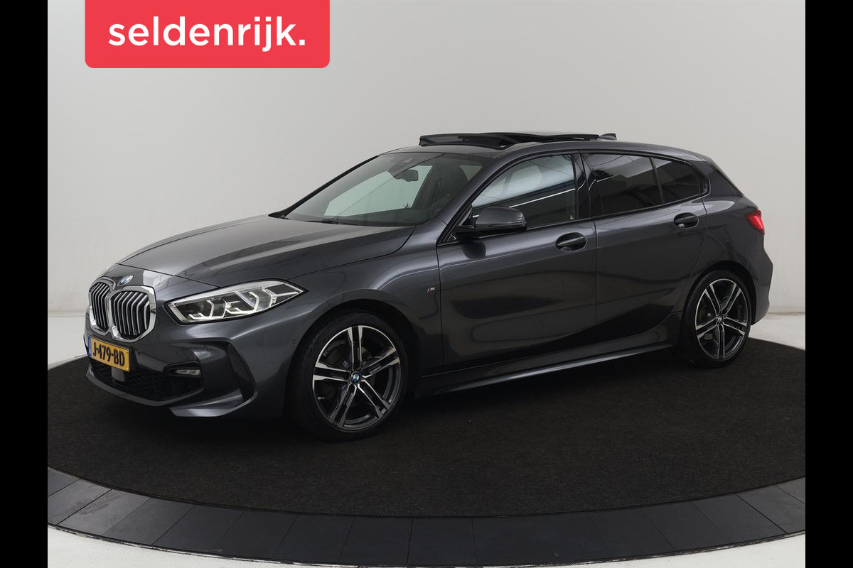 BMW 1-serie 118i M Sport | Panoramadak | Stoelverwarming | Harman/Kardon | Camera | Live Cockpit | Carplay | Sfeerverlichting | Sportstoelen | Full LED | Navigatie | Half leder | Park Assist | Climate control