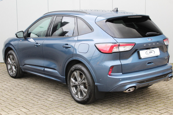 Ford Kuga 2.5-225 pk PHEV ST-Line X. Hybride rijden voor een reëel bedrag ! Slechts 31.500km ! Stoel-, stuur-, achterbank en voorraamverw., B&O soundsyst., Adaptieve Cruise Control, Climate Control dual, Camera v+a, Navigatie, Telefoonvoorb., Side- en lane assist etc.