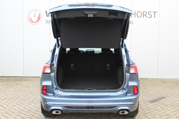 Ford Kuga 2.5-225 pk PHEV ST-Line X. Hybride rijden voor een reëel bedrag ! Slechts 31.500km ! Stoel-, stuur-, achterbank en voorraamverw., B&O soundsyst., Adaptieve Cruise Control, Climate Control dual, Camera v+a, Navigatie, Telefoonvoorb., Side- en lane assist etc.