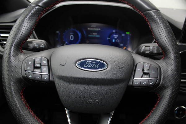 Ford Kuga 2.5-225 pk PHEV ST-Line X. Hybride rijden voor een reëel bedrag ! Slechts 31.500km ! Stoel-, stuur-, achterbank en voorraamverw., B&O soundsyst., Adaptieve Cruise Control, Climate Control dual, Camera v+a, Navigatie, Telefoonvoorb., Side- en lane assist etc.