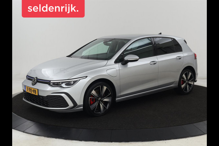 Volkswagen Golf 1.4 eHybrid GTE | SOH 92,6% | Stoelverwarming | Trekhaak | Carplay | Adaptive cruise | 18'' | Sportstoelen | Navigatie | Sfeerverlichting | Climate control | Parkeerhulp | PHEV | Plug In