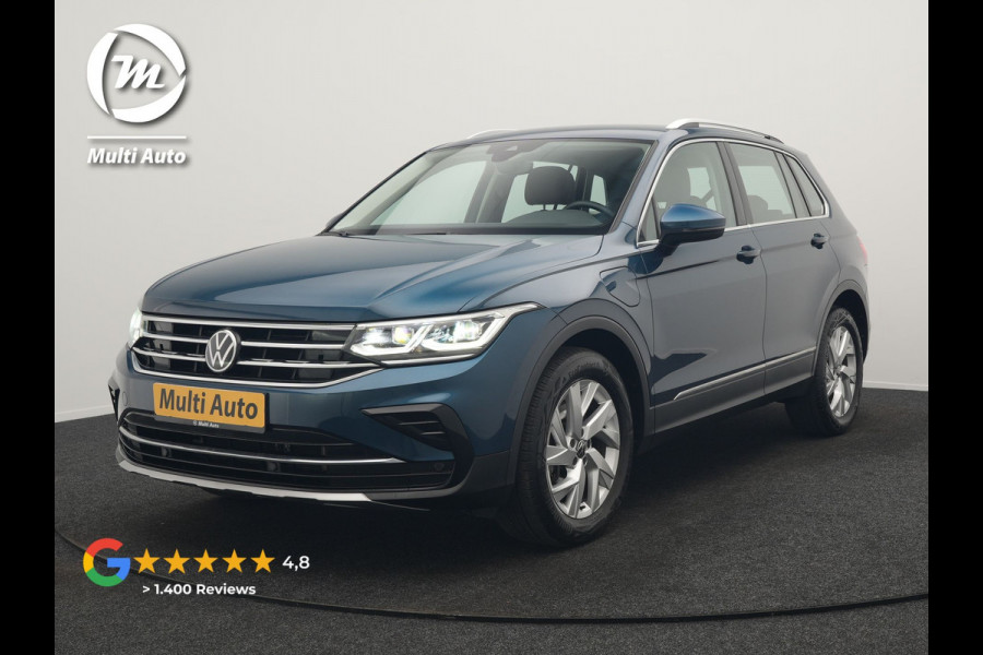 Volkswagen Tiguan 1.4 TSI eHybrid Elegance PHEV 245pk Dealer O.H. | Trekhaak Af Fabriek | Adaptive Cruise | IQ Light | Camera | Lederen Comfortzetels Memory & Verwarmd | Sfeerverlichting | Apple Carplay | Stuur Verwarmd | Navigatie | DAB | Plug In Hybrid |