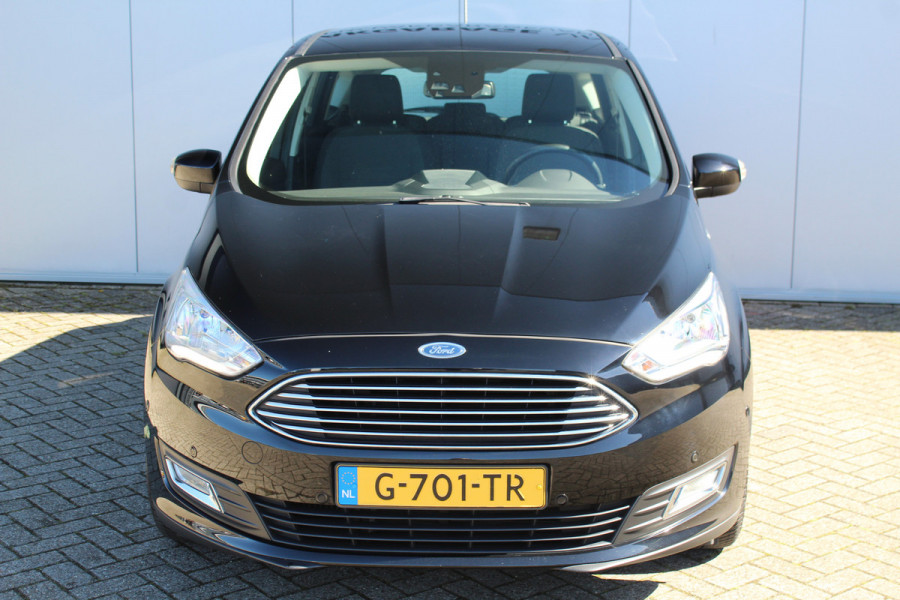 Ford C-MAX 1.0-125pk Titanium. Erg goed onderhouden hoogzitter, afkomstig van de 1e eig. Autm. airco dual, cruise control, navigatie, telefoonvoorb., voorraamverw., trekhaak, all season banden rondom, camera, parkeersensoren v+a etc.