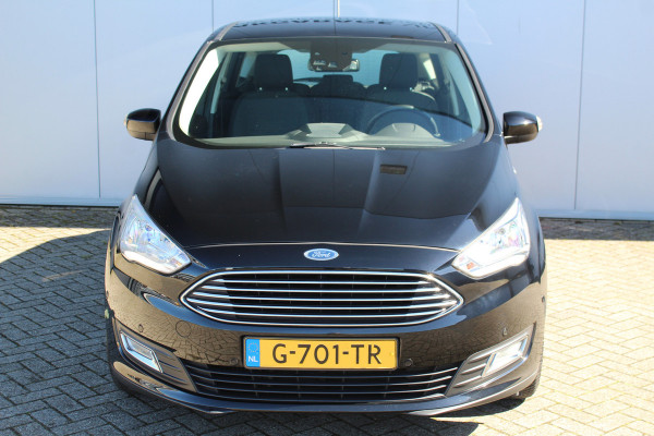 Ford C-MAX 1.0-125pk Titanium. Erg goed onderhouden hoogzitter, afkomstig van de 1e eig. Autm. airco dual, cruise control, navigatie, telefoonvoorb., voorraamverw., trekhaak, all season banden rondom, camera, parkeersensoren v+a etc.