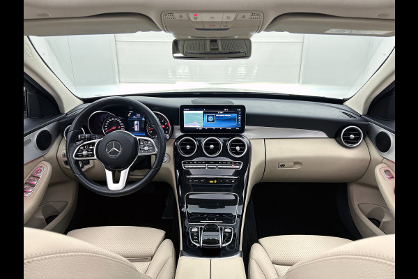 Mercedes-Benz C-Klasse Estate 180 Business Solution Avantgarde Trekhaak | Panoramadak | Multi spaaks lichtmetalen velgen | Navigatie | Parking support | Inclusief 24 maanden MB Certified garantie voor Europa.