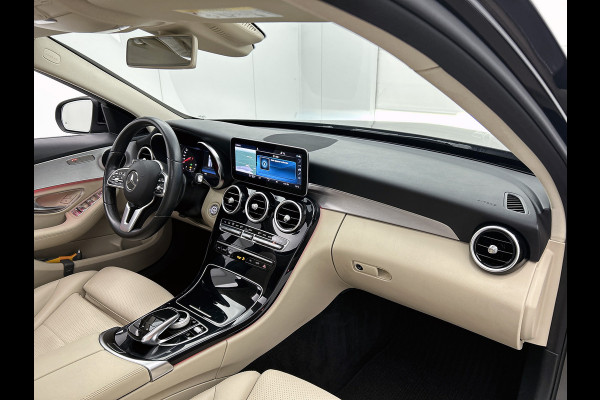 Mercedes-Benz C-Klasse Estate 180 Business Solution Avantgarde Trekhaak | Panoramadak | Multi spaaks lichtmetalen velgen | Navigatie | Parking support | Inclusief 24 maanden MB Certified garantie voor Europa.