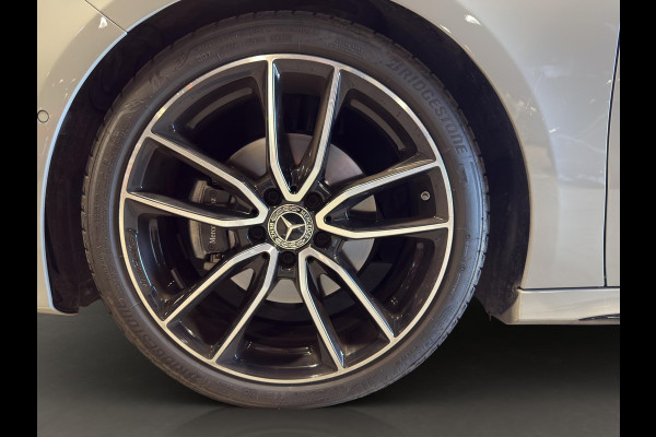 Mercedes-Benz A-Klasse 180 AMG Line | Pano | Sfeer | Stoelverw. | Camera | Trekhaak Electrisch |