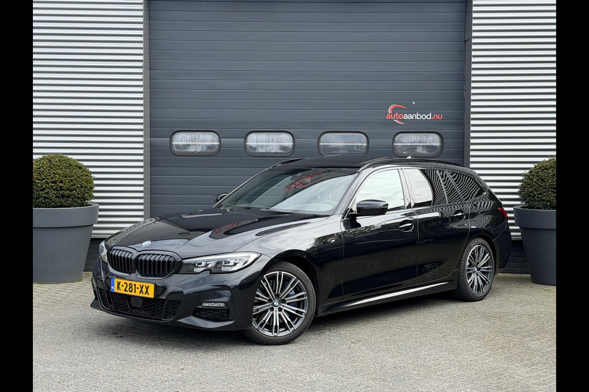 BMW 3 Serie Touring 320i High Executive M-Sport | Panoramadak | Camera | Head-Up Display | DAB | Stoelverwarming | Elektrische Achterklep |