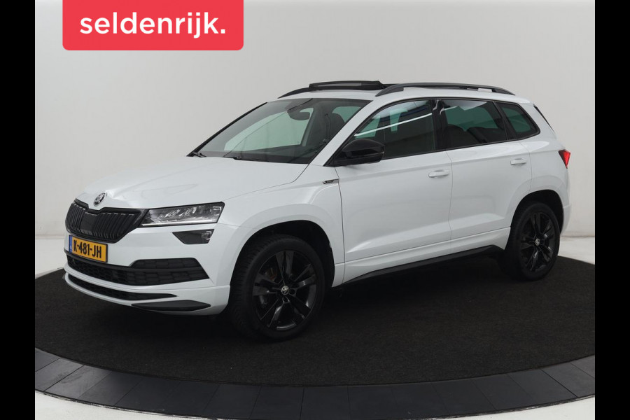 Škoda Karoq 1.5 TSI Sportline | Panoramadak | Stoelverwarming | Adaptive cruise | Camera | Sportstoelen | Virtual Cockpit | Navigatie | Sfeerverlichting | Full LED | 18'' | Keyless | Climate control