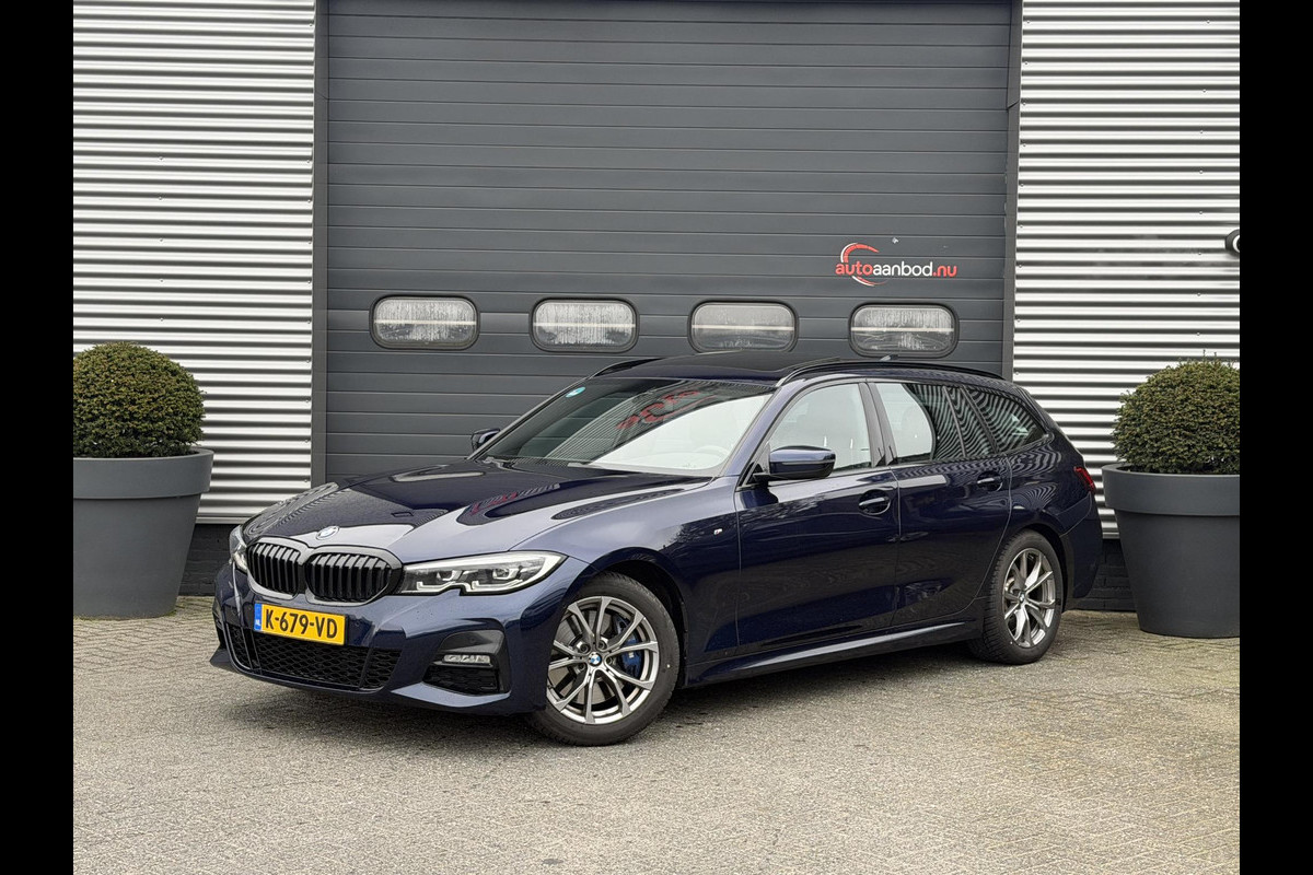 BMW 3 Serie Touring 320i High Executive M-Sport | Panoramadak | Camera | Head-Up Display | DAB |