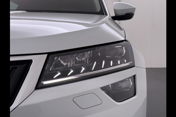 Škoda Karoq 1.5T 150pk ACT Trekhaak Adap.Cruise Camera Navi Virtual Cockpit ECC Apple Carplay Android PDC StoelverwarmingVerschuifbare Achte Comfort Pack Lmv Led Isofix DAB Voorruitverwarming Regen-Lichtsensor File Assist Verkeersbord Detectie 1.500KG Trekgewicht 1e Eigenaar Origineel Nederlandse Auto Bij 110.000km nog Beurt gehad! 1.500kg Trekgewicht! EURO6