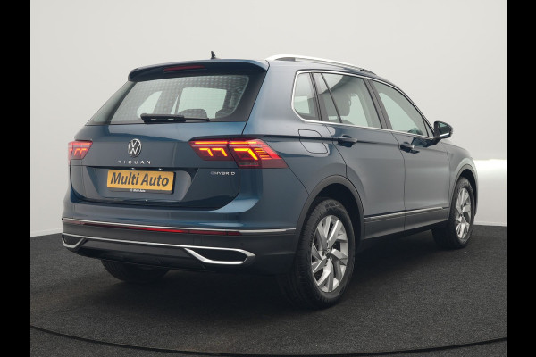 Volkswagen Tiguan 1.4 TSI eHybrid Elegance PHEV 245pk Dealer O.H. | Trekhaak Af Fabriek | Adaptive Cruise | IQ Light | Camera | Lederen Comfortzetels Memory & Verwarmd | Sfeerverlichting | Apple Carplay | Stuur Verwarmd | Navigatie | DAB | Plug In Hybrid |