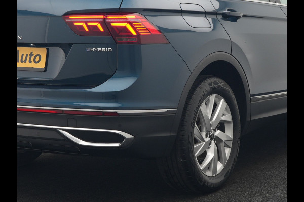 Volkswagen Tiguan 1.4 TSI eHybrid Elegance PHEV 245pk Dealer O.H. | Trekhaak Af Fabriek | Adaptive Cruise | IQ Light | Camera | Lederen Comfortzetels Memory & Verwarmd | Sfeerverlichting | Apple Carplay | Stuur Verwarmd | Navigatie | DAB | Plug In Hybrid |