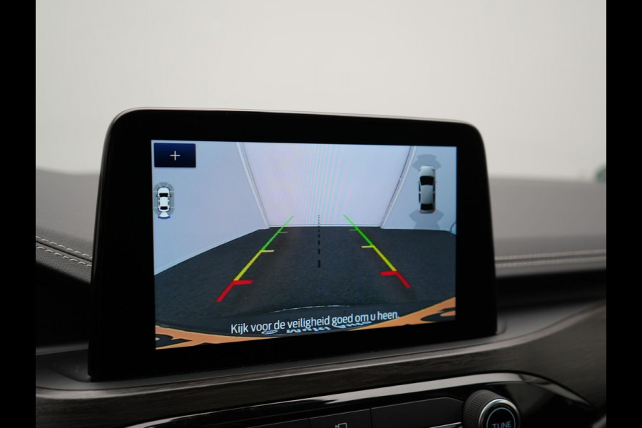 Ford Kuga 2.5 Vignale PHEV 225pk Dealer O.H | Panodak | Head Up | Bang & Olufsen Sound | Adaptive Cruise | 360 Camera | Lederen Sportstoelen Memory & Verwarmd | Keyless | Pilot Assist | Blis | Apple Carplay | Navigatie | Virtual | DAB  | Plug In Hybrid |