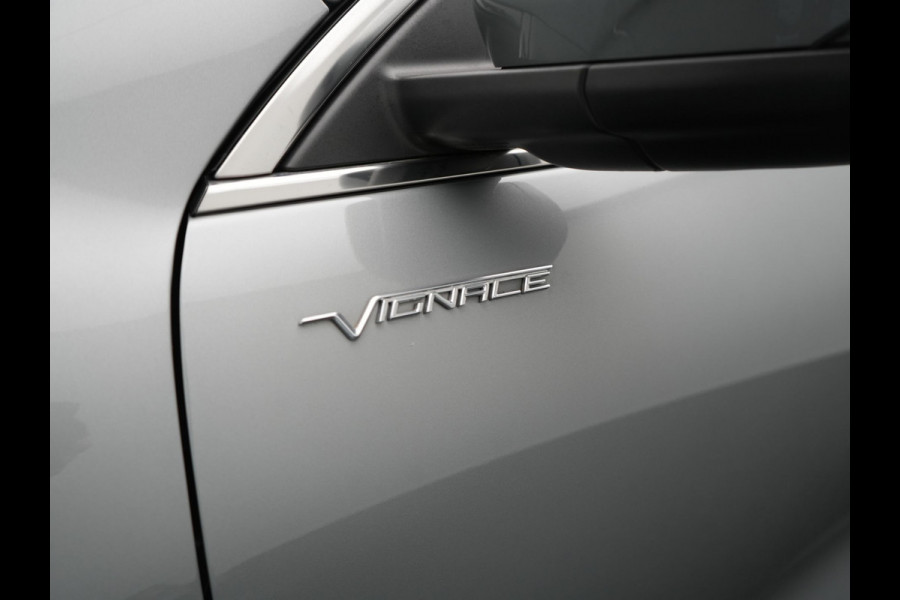 Ford Kuga 2.5 Vignale PHEV 225pk Dealer O.H | Panodak | Head Up | Bang & Olufsen Sound | Adaptive Cruise | 360 Camera | Lederen Sportstoelen Memory & Verwarmd | Keyless | Pilot Assist | Blis | Apple Carplay | Navigatie | Virtual | DAB  | Plug In Hybrid |