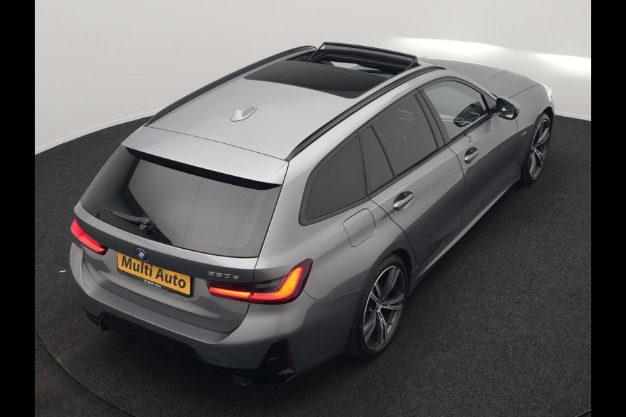 BMW 3 Serie Touring 330e M Sport FACELIFT PHEV 293pk Dealer O.H. | Trekhaak Af Fabriek | Panodak | Harman / Kardon | Sfeerverlichting | Sportstoelen Verwarmd | Widescreen Navi | Apple Carplay | Blis | DAB | Plug In Hybrid |