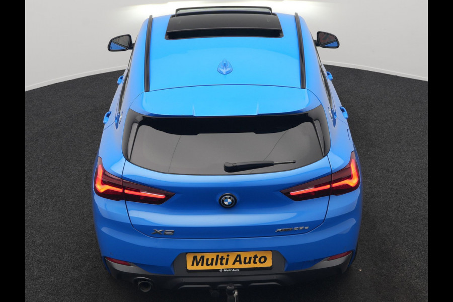 BMW X2 xDrive25e M Sport PHEV 220pk Dealer O.H. | Trekhaak Afn. | Panodak | Adaptive Cruise | Head Up | Camera | Harman / Kardon | Lederen Competition Stoelen Memory & Verwarmd | Keyless | 19"L.M | Sfeerverlichting | Navigatie | DAB | Plug