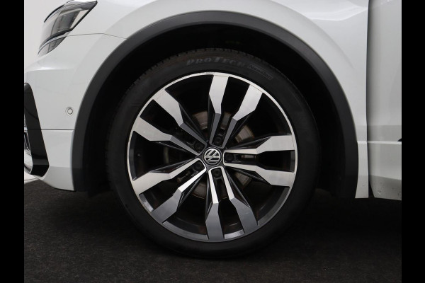 Volkswagen Tiguan 1.4 TSI R Line | Panoramadak | Stoelverwarming | LED Plus | Trekhaak | Camera | Keyless | 20'' | Adaptive cruise | Virtual Cockpit | Navigatie | Park Assist | DAB | Climate control | Getint glas