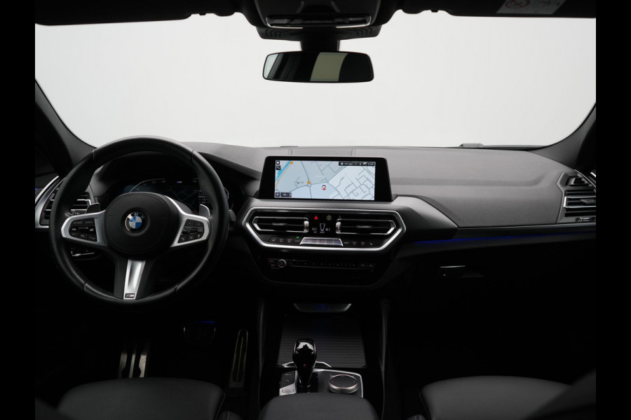 BMW X4 xDrive20i M Sport 184pk Dealer O.H. Carbon Schwarz Metallic | Adaptive Cruise | Camera | Sfeerverlichting | Lederen Sportstoelen Verwarmd | Apple Carplay | Virtual Cockpit | Navigatie | DAB | 19"L.M |