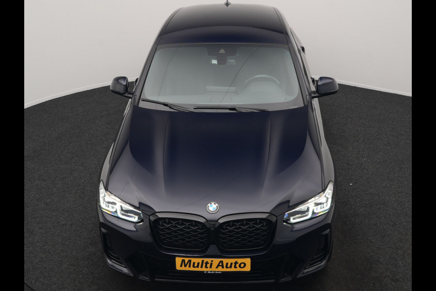 BMW X4 xDrive20i M Sport 184pk Dealer O.H. Carbon Schwarz Metallic | Adaptive Cruise | Camera | Sfeerverlichting | Lederen Sportstoelen Verwarmd | Apple Carplay | Virtual Cockpit | Navigatie | DAB | 19"L.M |