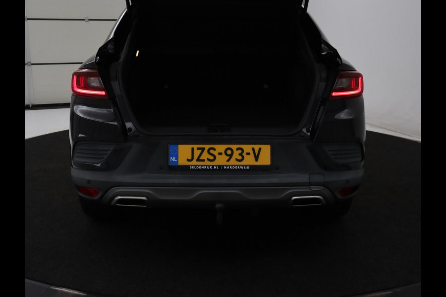 Renault Arkana 1.6 E-Tech Hybrid 145 R.S. Line | Leder/Alcantara | Stoelverwarming | Trekhaak | Adaptive cruise | Camera | Carplay | Keyless | Park Assist | Full LED | Navigatie