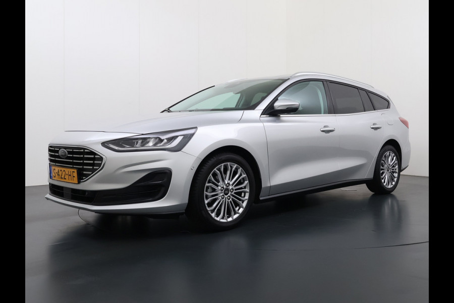 Ford FOCUS Wagon T 125PK Hybride Trekhaak Navi Camera LED Dual-ECC Keyless FordPass-ConnectStoel+Stuur+Voorruitverwarming Apple Carplay Android A DAB Bluetooth Lmv 17" Ecc GSM Draadloos Opladen Led Privacy Glas Isofix Lane Assist Keyless Licht-/regensensor Origineel Nederlandse Auto  € 34.000 nieuw