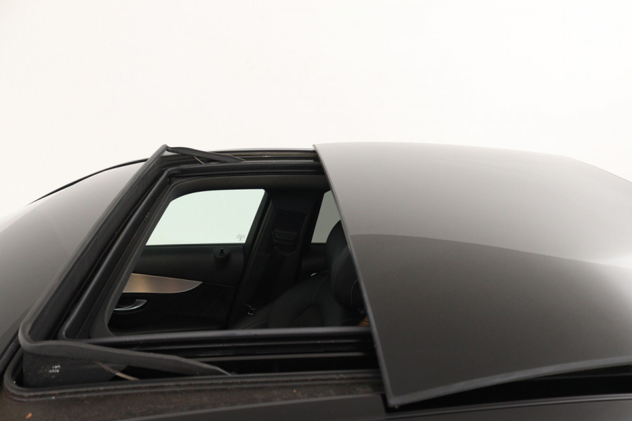 Mercedes-Benz C-Klasse 180 Business Solution AMG (PANORAMADAK, ADAPTIVE CRUISE, STOELVERWARMING, PDC, CAMERA, NAVIGATIE)