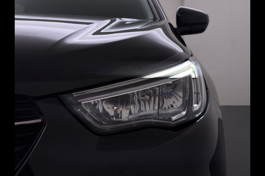 Opel Grandland X T131PK Trekhaak AGR Navi Apple Carplay Android 1/2 Leer Cruise Control Pdc ECC Ergocomfort Stoel Business Executive Lmv Privacy Glas Led DAB+ Regen-Lichtsensor Lane Assist 1.400KG Trekgewicht 1e Eigenaar Origineel Nederlandse Auto € 34.000