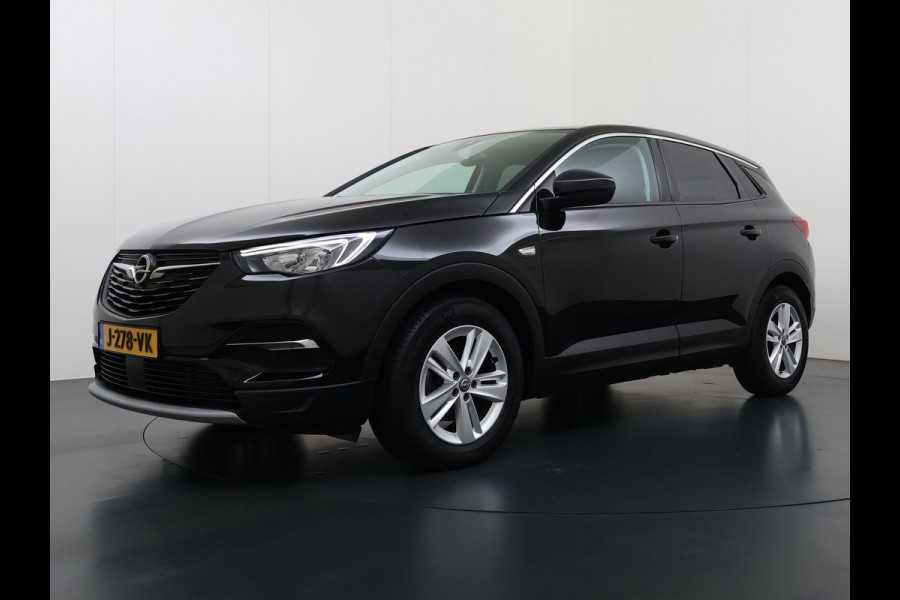 Opel Grandland X T131PK Trekhaak AGR Navi Apple Carplay Android 1/2 Leer Cruise Control Pdc ECC Ergocomfort Stoel Business Executive Lmv Privacy Glas Led DAB+ Regen-Lichtsensor Lane Assist 1.400KG Trekgewicht 1e Eigenaar Origineel Nederlandse Auto € 34.000