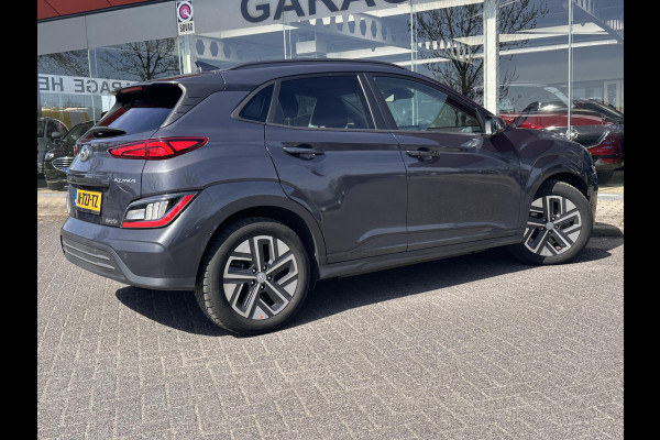 Hyundai Kona EV Fashion 64 kWh | SOH: 96,3%| Facelift | 3 Fase | Warmtepomp | Navi | HUD | Adaptive CC | Camera |