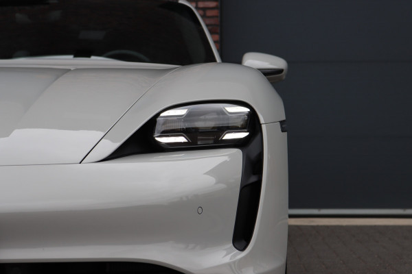 Porsche Taycan Sport Turismo 79 kWh | Achterasbesturing | Luchtvering | Sport-Chrono | ACC | Panoramadak | 18-wegs | BOSE |  Memory | Surround Camera | Verwarmd Stuurwiel |