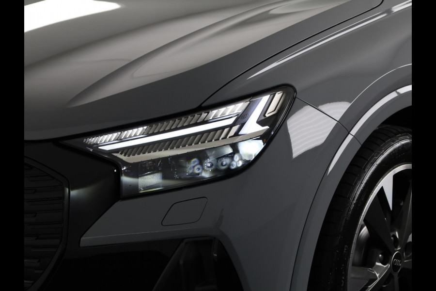 Audi Q4 e-tron 45 quattro S Edition Competition 82 kWh Ambient Light | Achteruitrijcamera | Apple Carplay | Zwart optiek pakket | Adaptive cruise control |