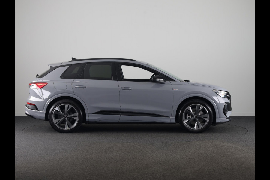 Audi Q4 e-tron 45 quattro S Edition Competition 82 kWh Ambient Light | Achteruitrijcamera | Apple Carplay | Zwart optiek pakket | Adaptive cruise control |